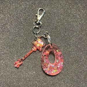 Pink “O” letter keychain $12
